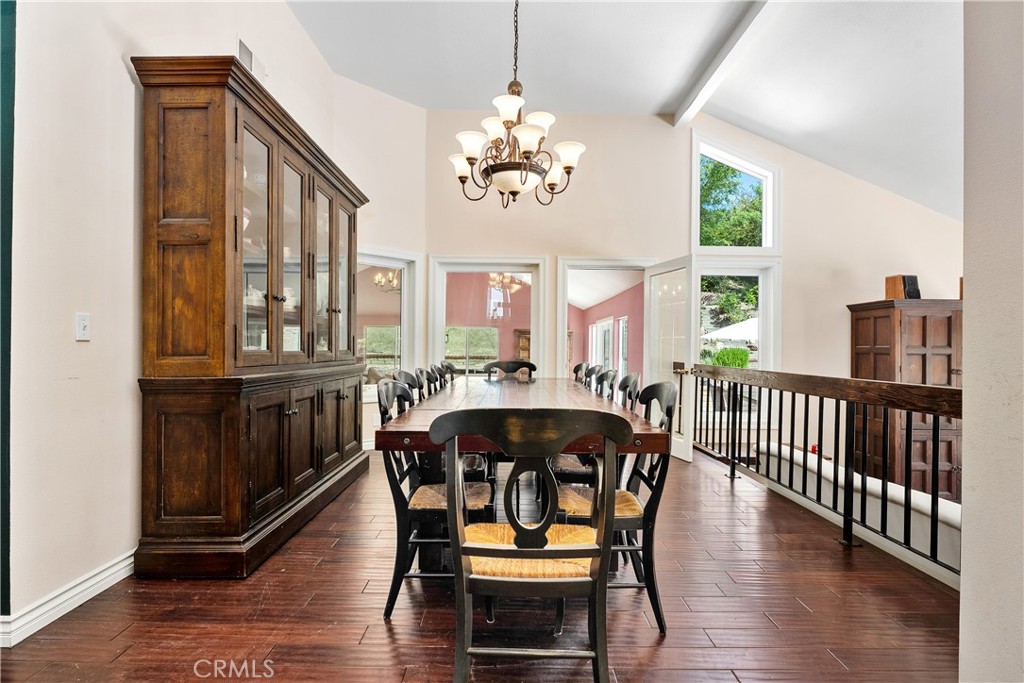 21732 Exton Way Lake Forest, CA 92630 - Photo 5 of 29 Main level dining room overlooks sunken living room to the left and inlaw suite to the back.