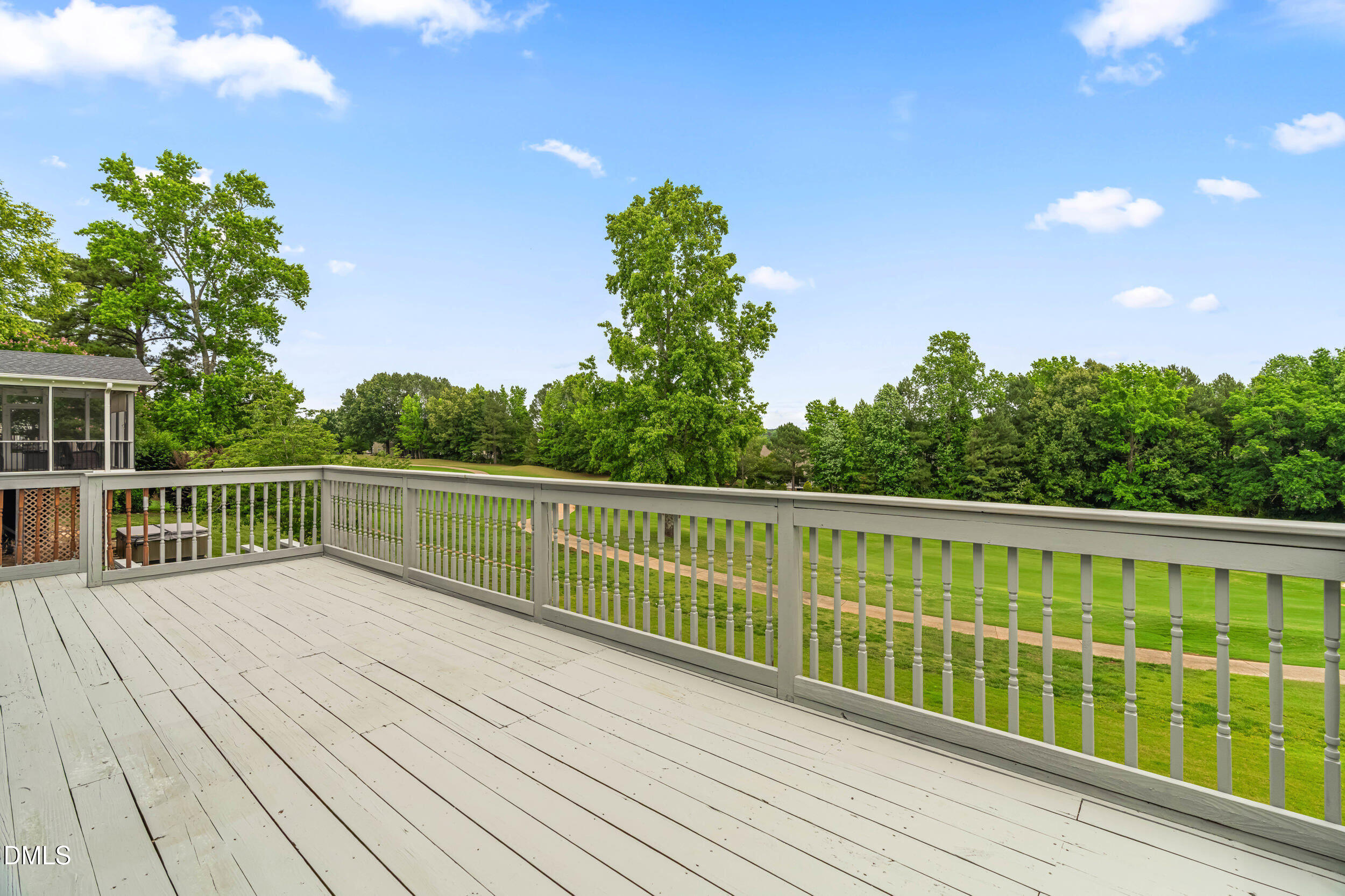 744 Seastone Street Raleigh, NC 27603 - Photo 42 of 53 a view of balcony with deck and wooden floor