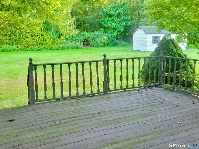 a view of a street from a balcony