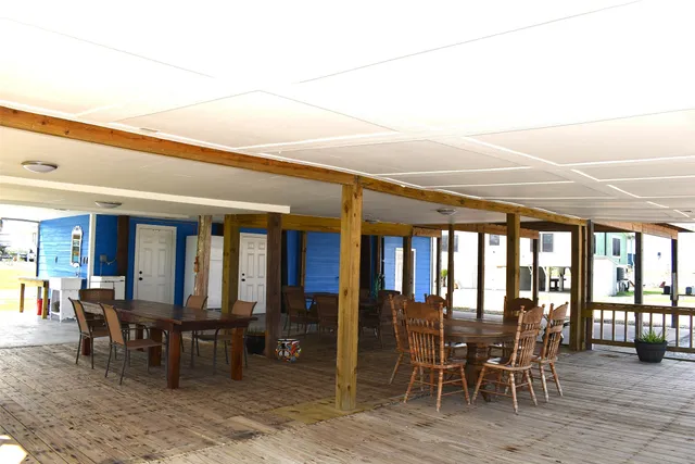 a view of living room kitchen and entryway