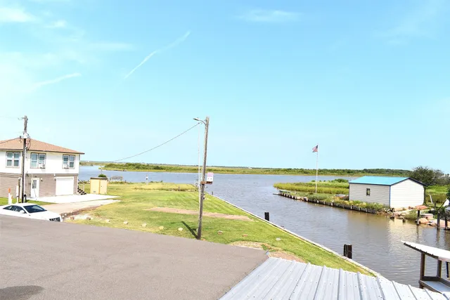 a view of a swimming pool with an ocean view
