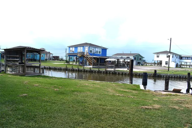 a view of a lake with a house