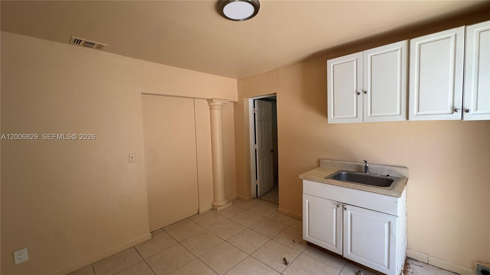 3733 Kirk Road Lake Worth, FL 33461 - Photo 15 of 24 a bathroom with a sink and a mirror