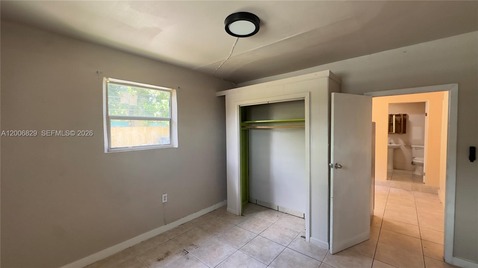 3733 Kirk Road Lake Worth, FL 33461 - Photo 18 of 24 a view of a hallway to rooms