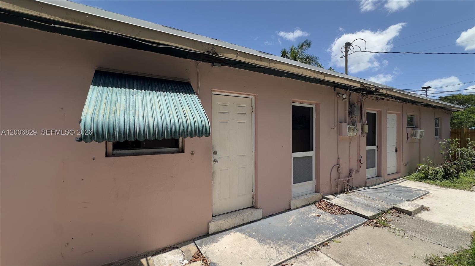 3733 Kirk Road Lake Worth, FL 33461 - Photo 23 of 24 a front view of a house