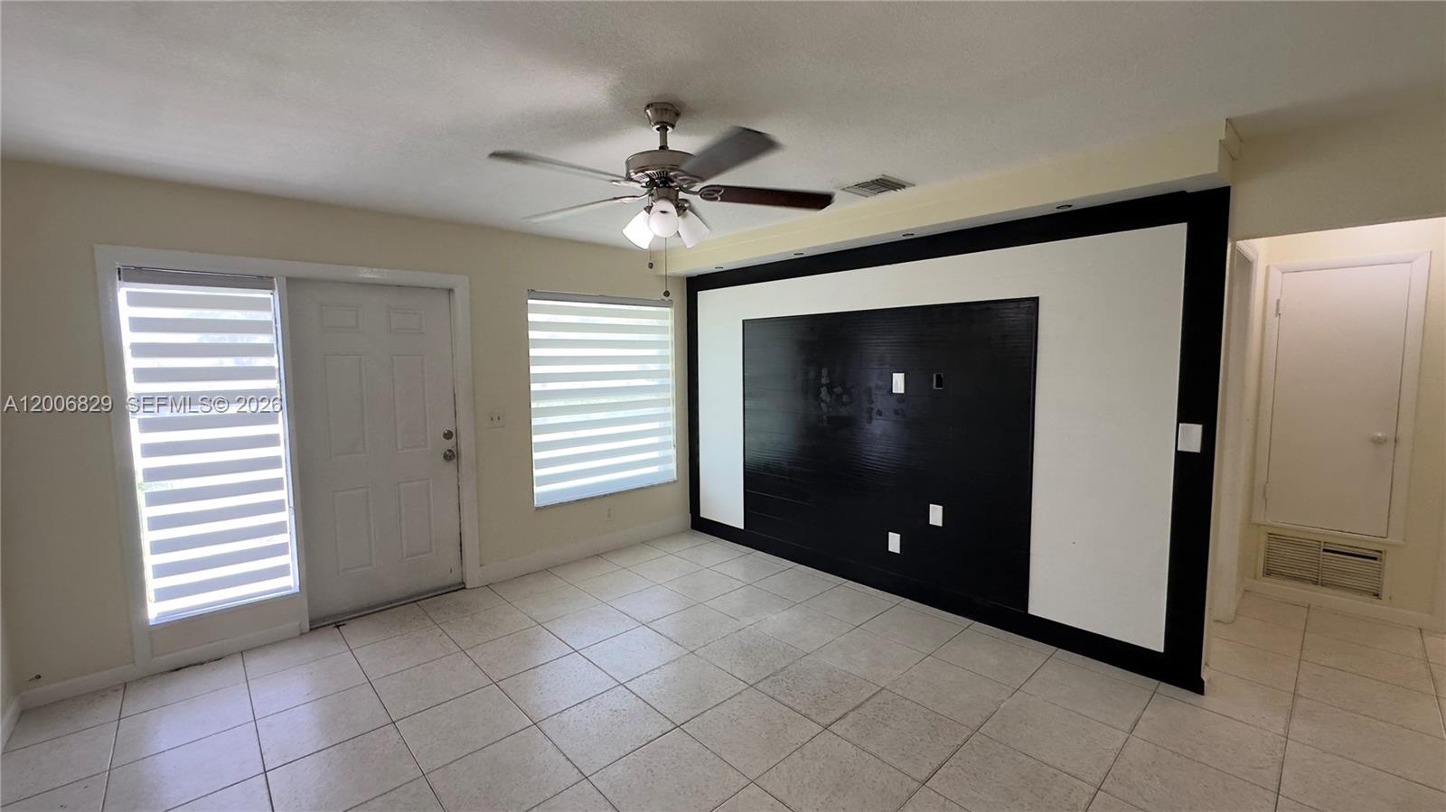 3733 Kirk Road Lake Worth, FL 33461 - Photo 4 of 24 a view of a livingroom with a and entryway