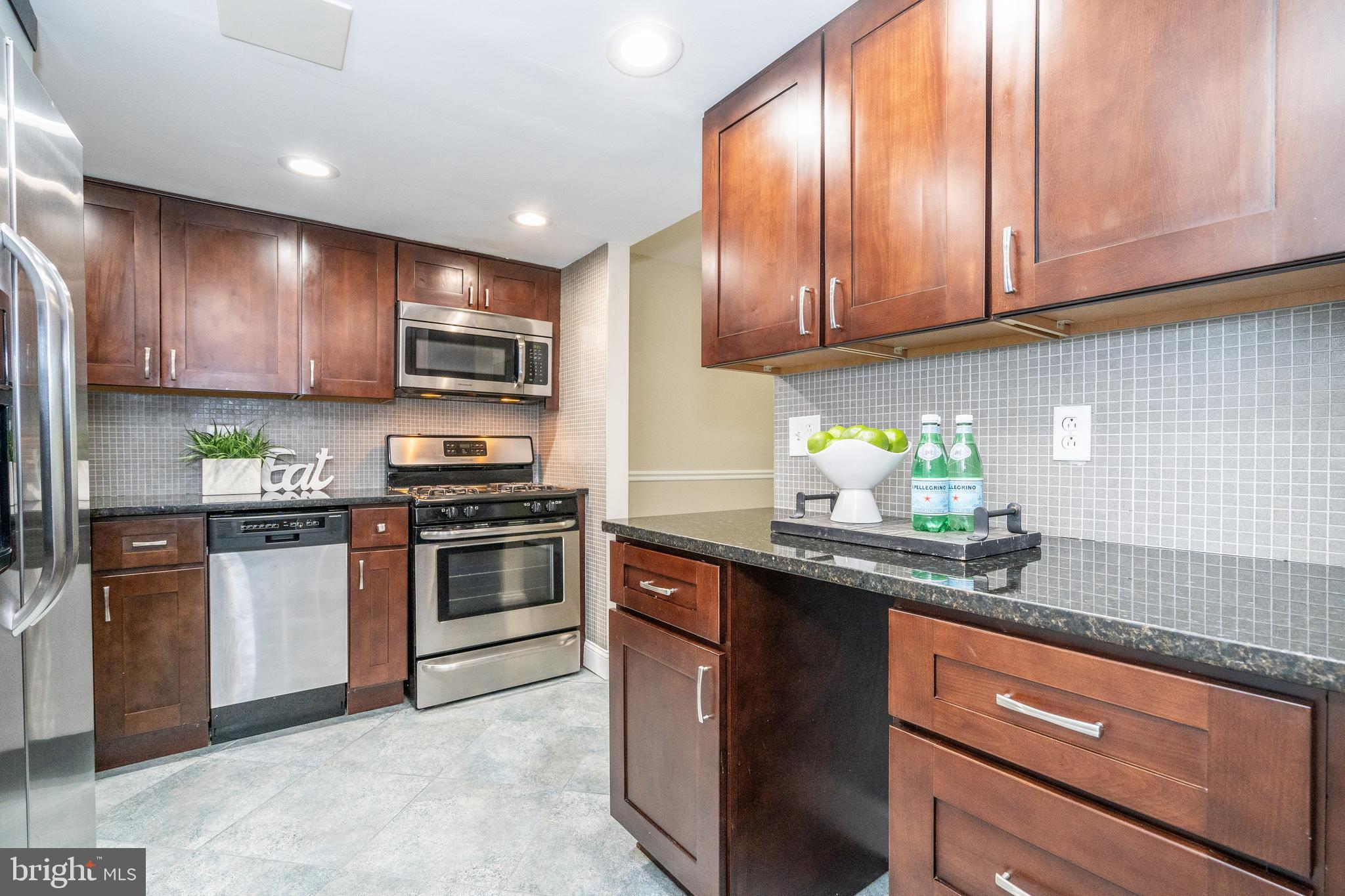 1406 Northgate Square, Unit 2C Reston, VA 20190 - Photo 2 of 53 Updated kitchen with stainless steel appliances!