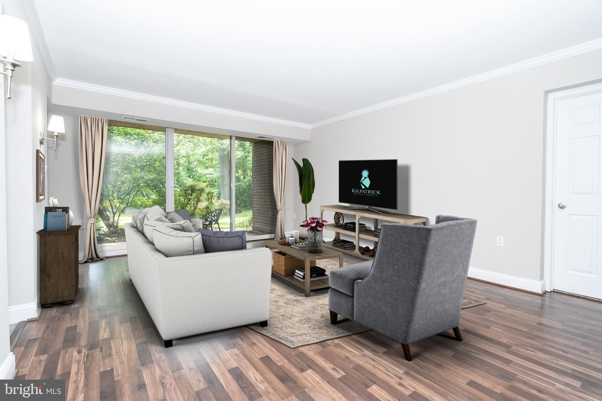 1406 Northgate Square, Unit 2C Reston, VA 20190 - Photo 3 of 53 Spacious living room with floor to ceiling windows