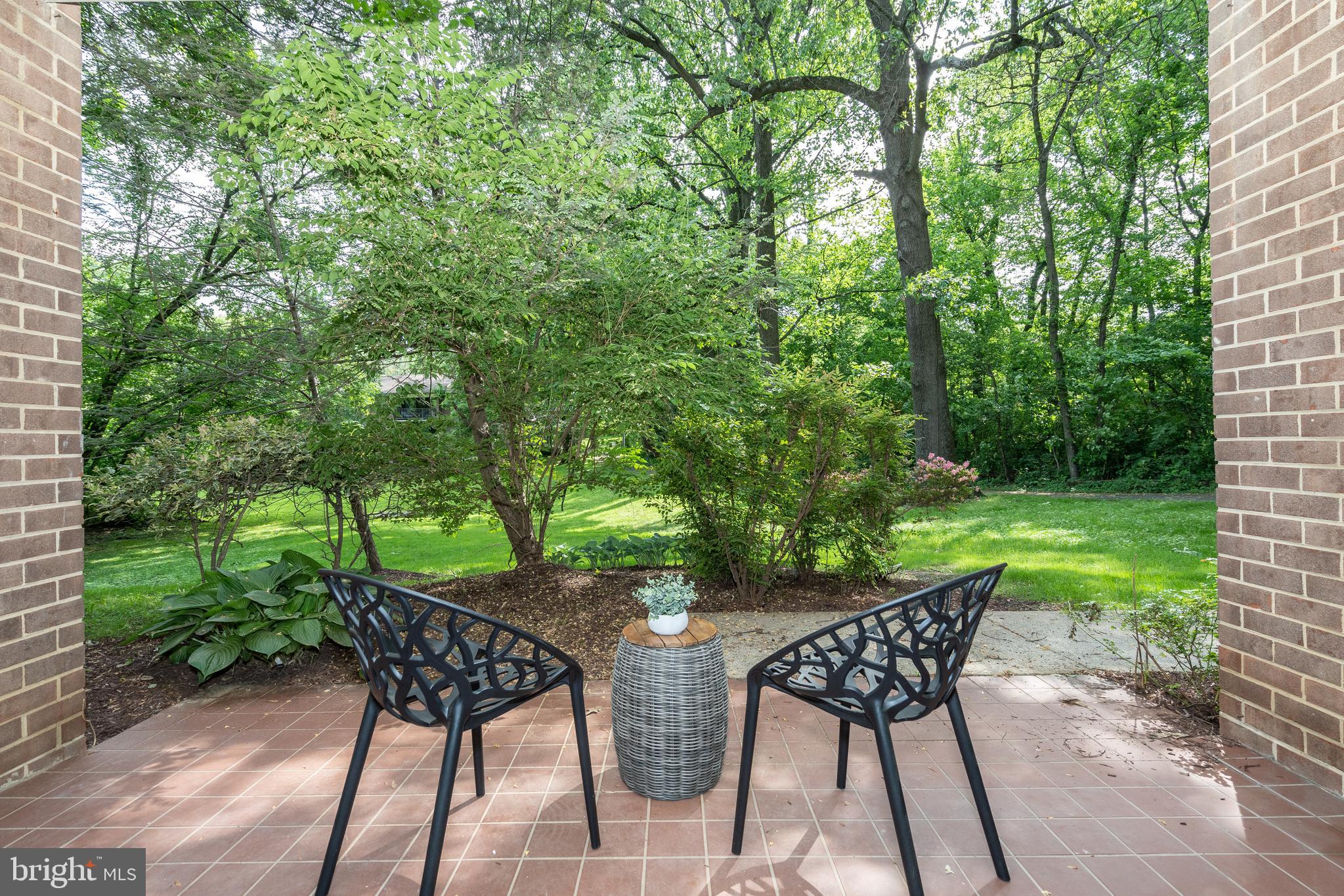 1406 Northgate Square, Unit 2C Reston, VA 20190 - Photo 4 of 53 Covered ground level patio backing to common area!