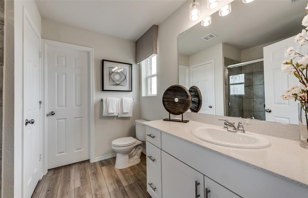 1092 Clear Dusk Lane Forney, TX 75126 - Photo 13 of 17 Owner's private bath with double vanity *Model Representation*