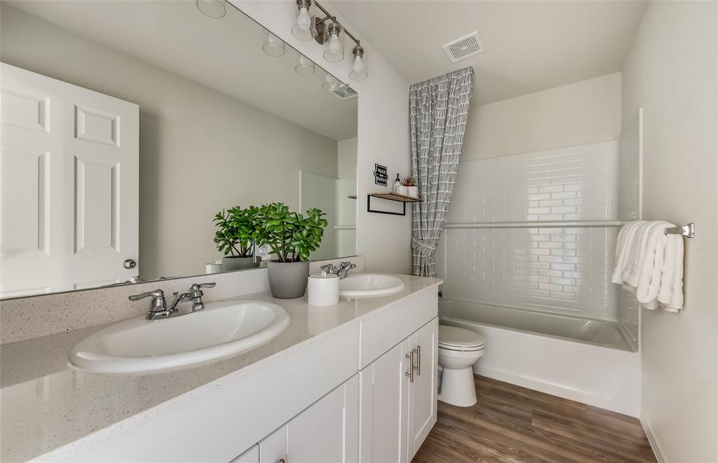 1092 Clear Dusk Lane Forney, TX 75126 - Photo 16 of 17 Spacious secondary bathroom *Model Representation*