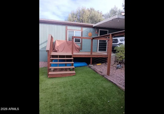 a house view with a garden space