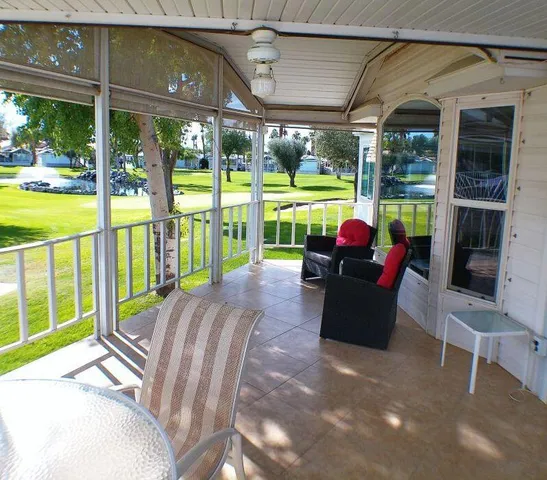 a living room with furniture and window