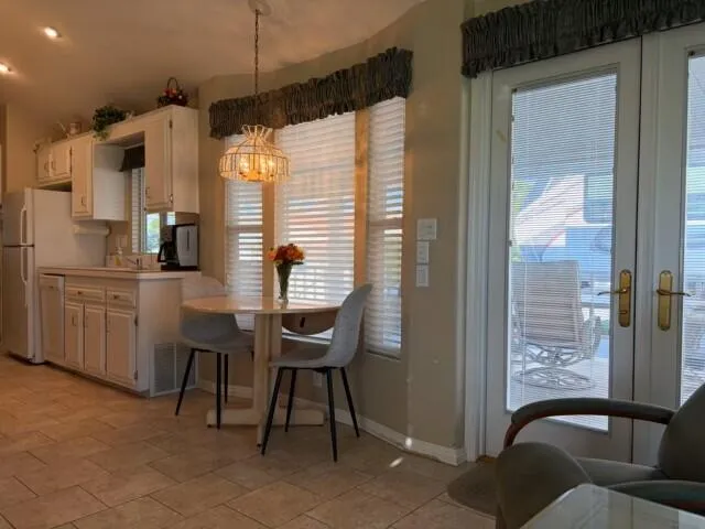 a view of a living room and bathroom