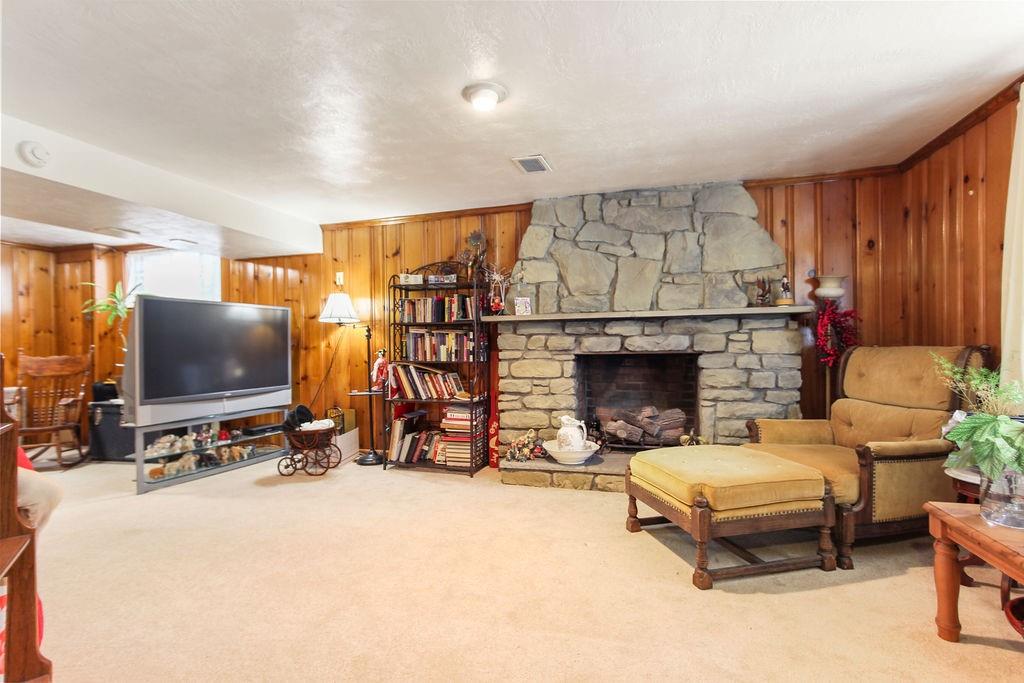 2025 Beulah Road Pittsburgh, PA 15235 - Photo 30 of 43 Stone fireplace with gas logs.
