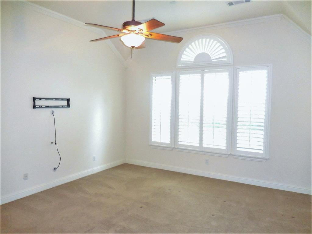 4012 Appleton Lane Flower Mound, TX 75022 - Photo 14 of 28 an empty room with chandelier fan