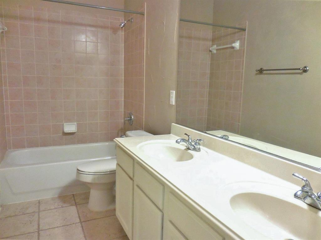 4012 Appleton Lane Flower Mound, TX 75022 - Photo 20 of 28 a bathroom with a sink toilet and shower