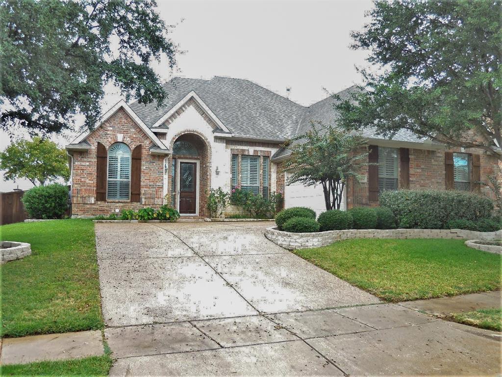 4012 Appleton Lane Flower Mound, TX 75022 - Photo 2 of 28 a view of a yard in front of house