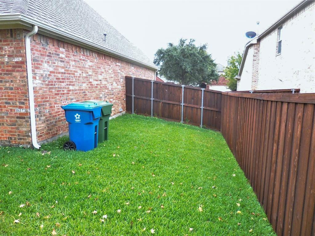 4012 Appleton Lane Flower Mound, TX 75022 - Photo 27 of 28 a backyard of a house with barbeque oven