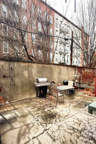 a view of outdoor space with water fountain