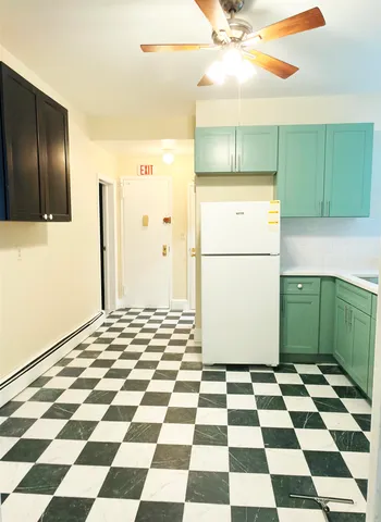 a view of a storage & utility room with a window