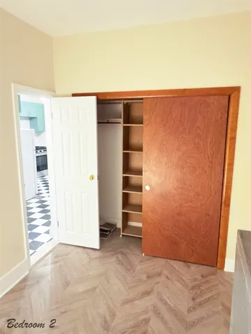 an empty room with closet