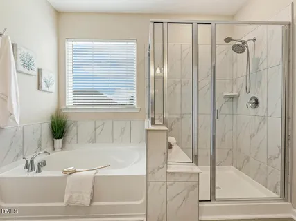 a view of a swimming pool with a lounge chairs