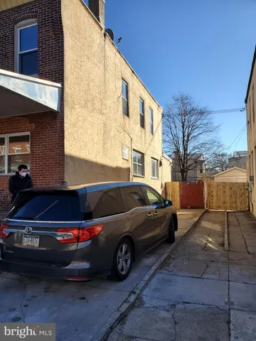 a car parked in front of a building