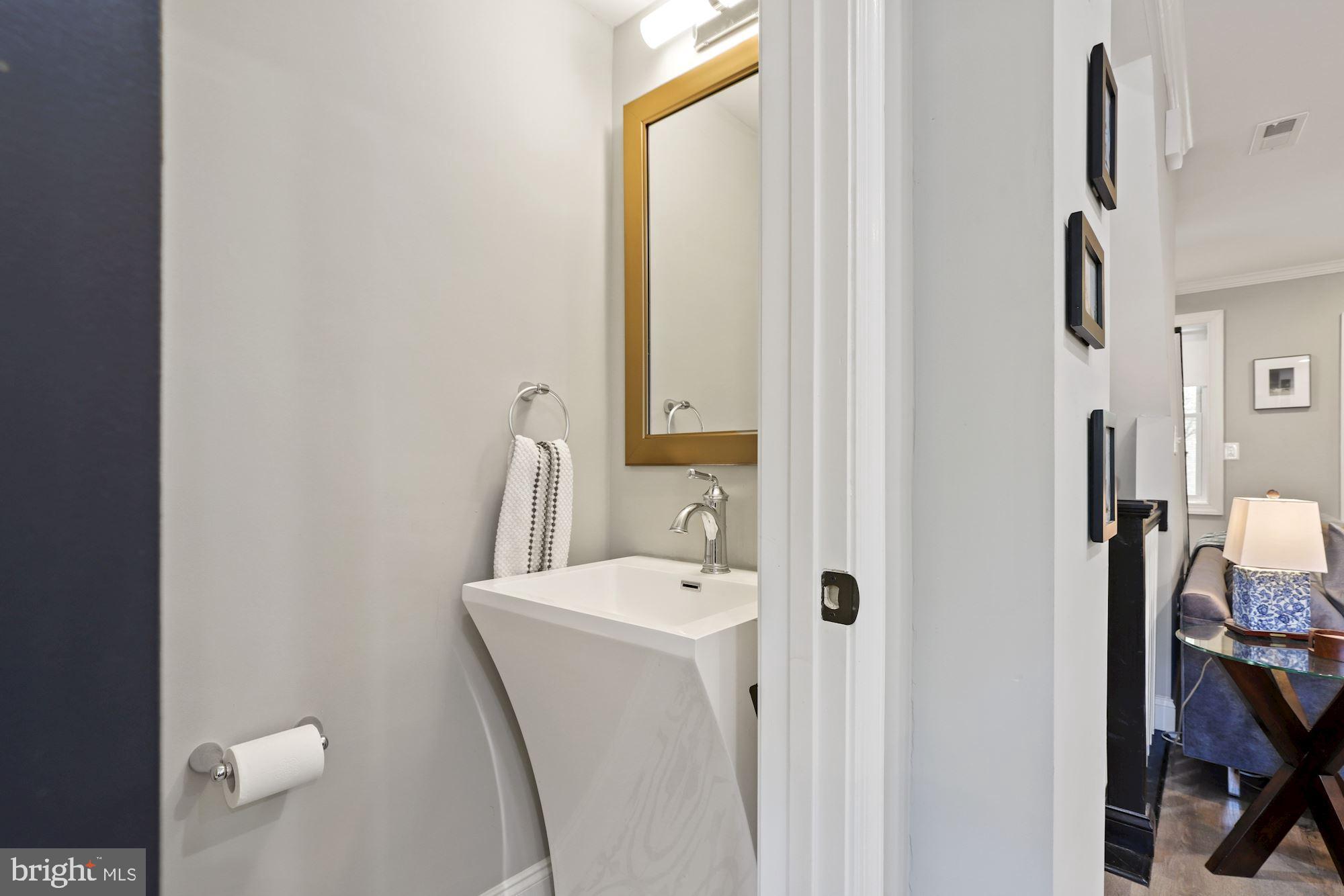 1634 Ridge Place Southeast Washington, DC 20020 - Photo 8 of 27 Stylish Powder Room on Main level