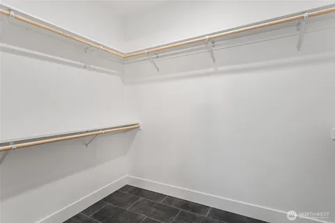 a view of an empty walk in closet