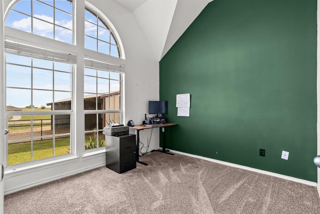 115 Blue Castle Court Weatherford, TX 76088 - Photo 19 of 33 a view of an empty room with a window