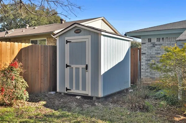 a view of outdoor space and front view of a house