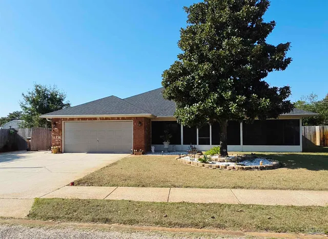 a front view of a house with yard