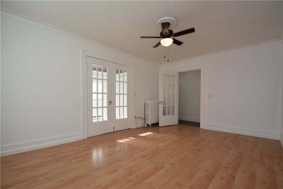 34 Terrace Park Rochester, NY 14619 - Photo 12 of 22 Spacious living room with updated flooring!