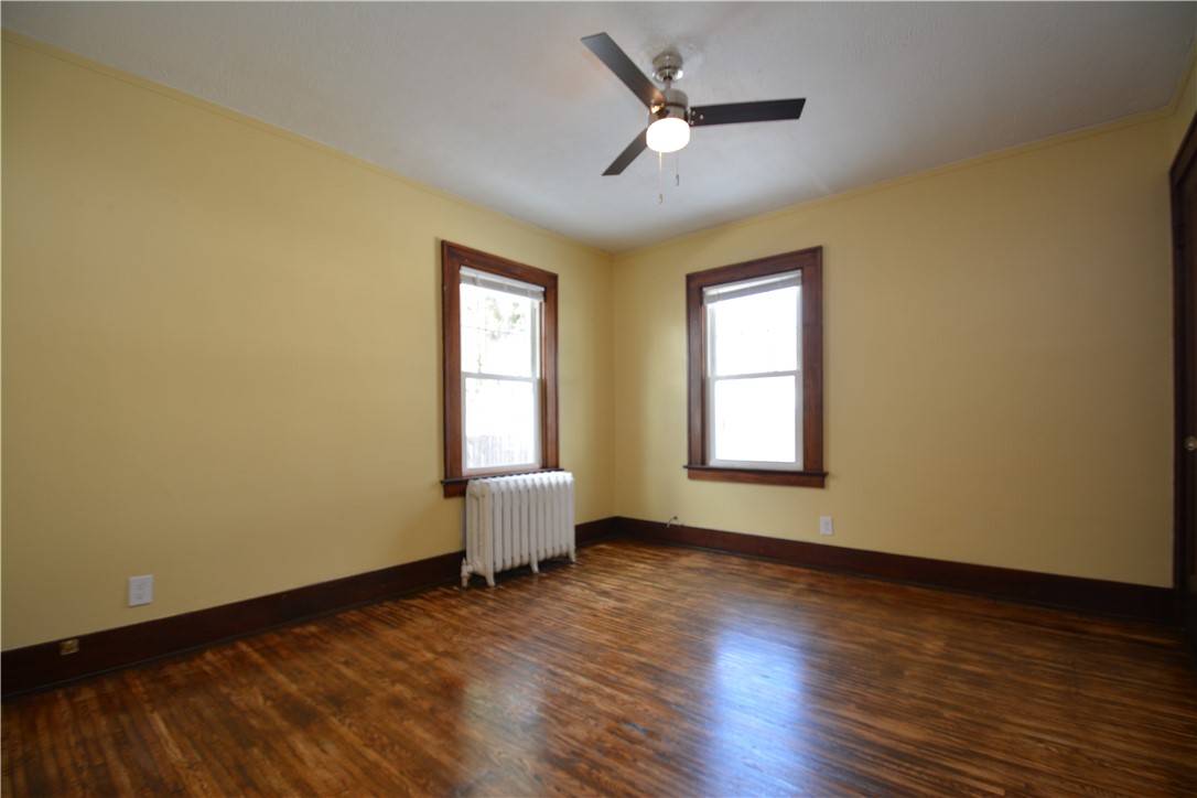 34 Terrace Park Rochester, NY 14619 - Photo 20 of 22 Bedroom 2 with ceiling fan! and hardwood flooring