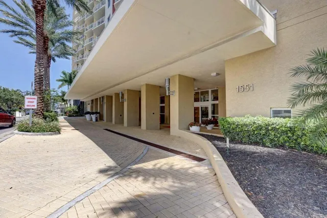 a view of a swimming pool with a yard