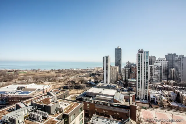 a view of kitchen and empty room