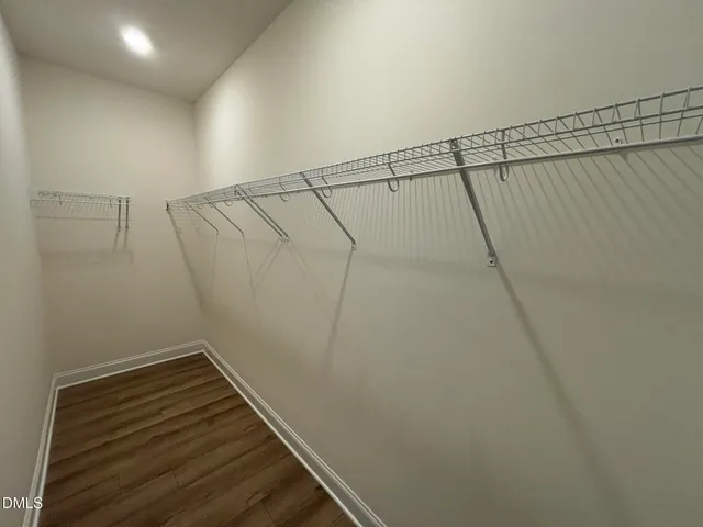 a view of a room with racks on the wall