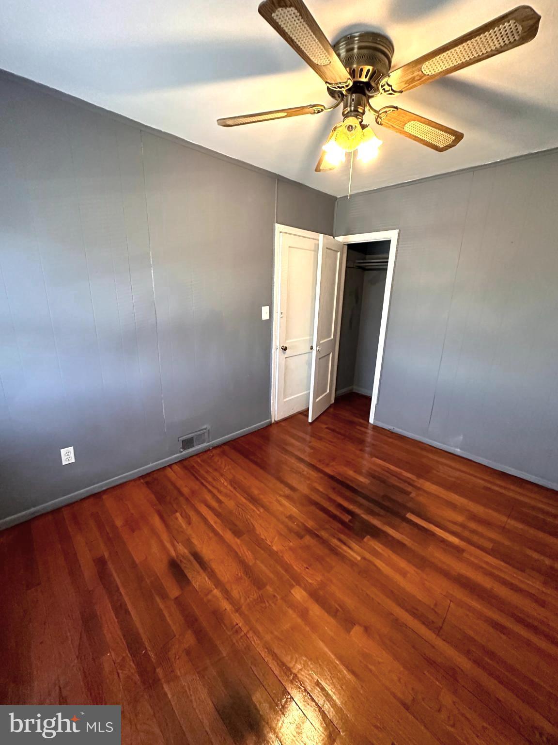 1008 Tunbridge Road Baltimore, MD 21212 - Photo 13 of 19 wooden floor in an empty room
