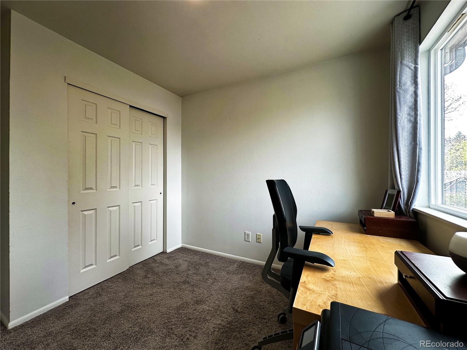 10753 Routt Court Broomfield, CO 80021 - Photo 17 of 24 a workspace with table and chair