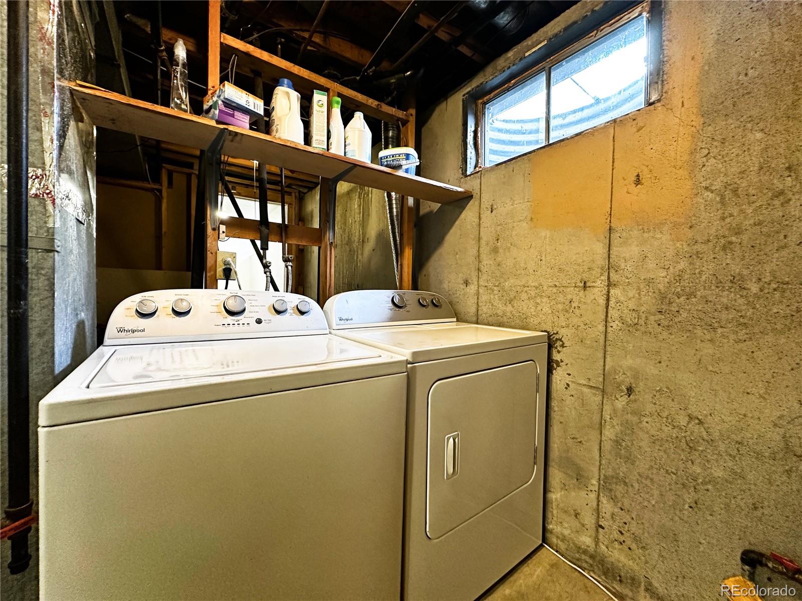 10753 Routt Court Broomfield, CO 80021 - Photo 21 of 24 a utility room with dryer and washer