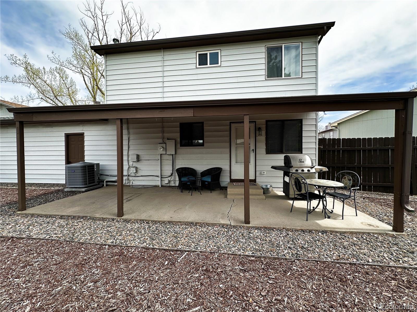 10753 Routt Court Broomfield, CO 80021 - Photo 23 of 24 a view of a house with a patio