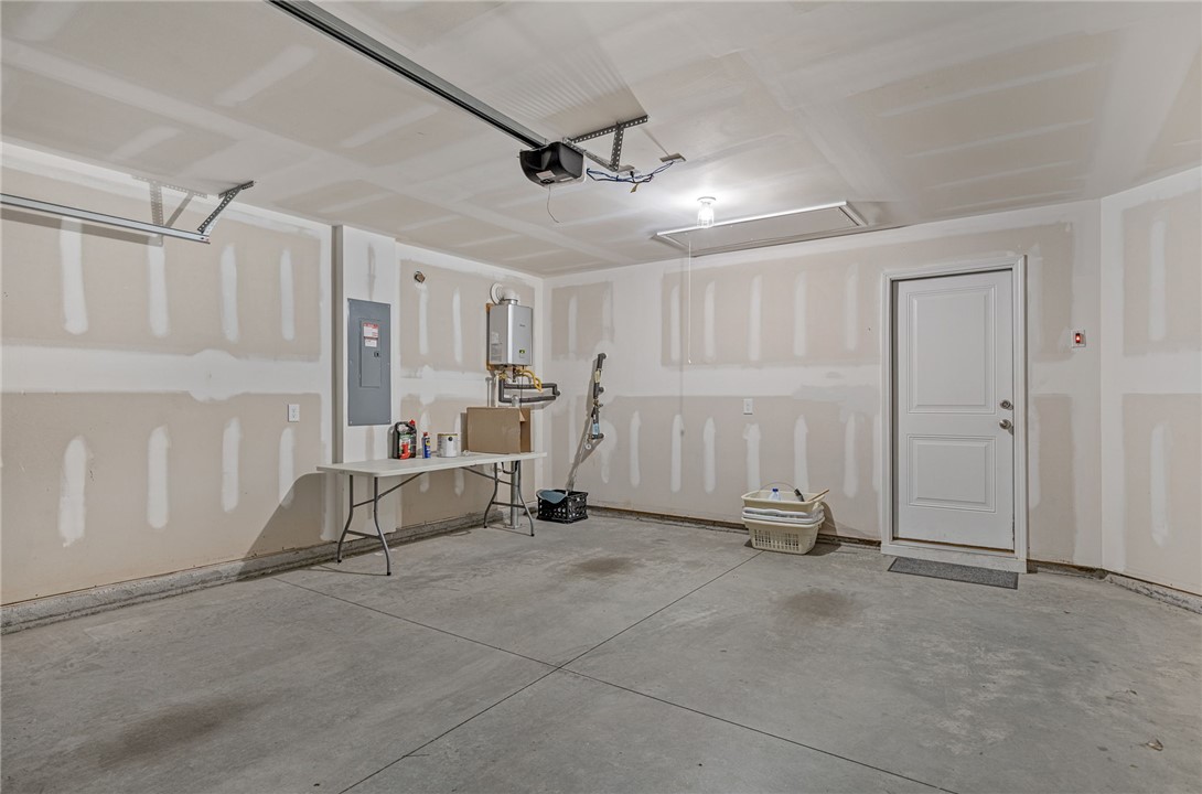 24 Chalet Court Anderson, SC 29621 - Photo 29 of 39 Spacious utility garage offering both storage and convenient access.