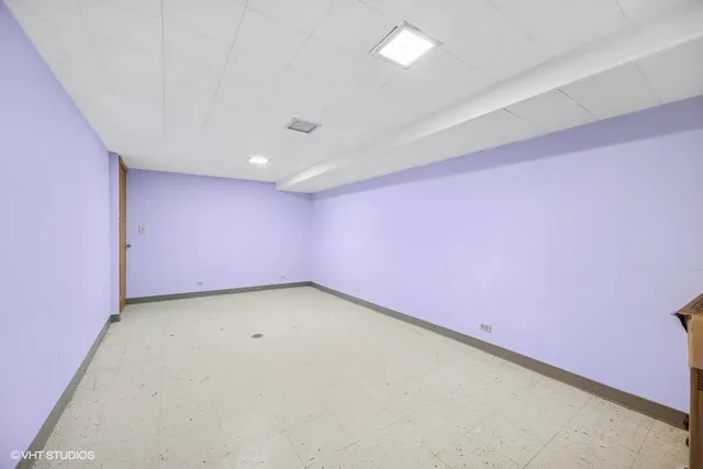 an empty room with a projector