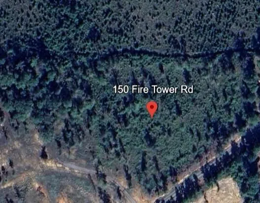 a sign on the side of the road