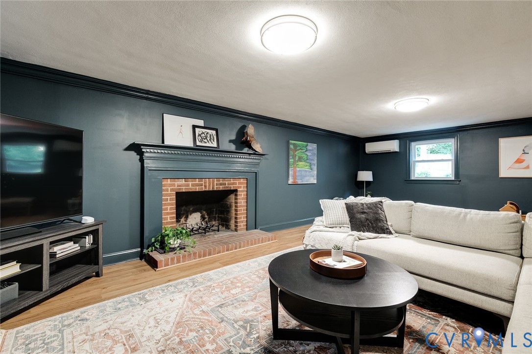 3630 Wakefield Road Richmond, VA 23235 - Photo 32 of 46 Basement lounge with fireplace, new lighting, new