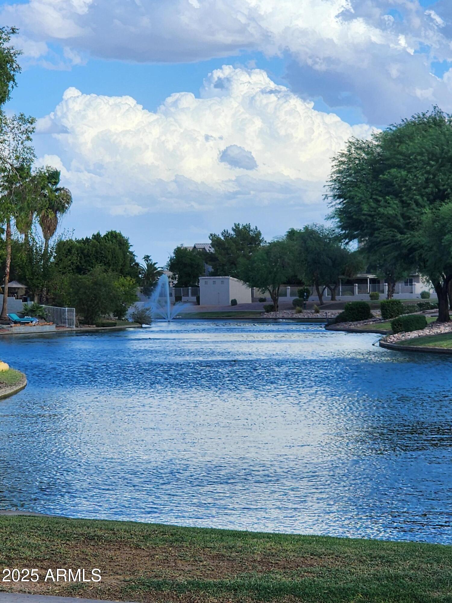 217 West Smoke Tree Road Gilbert, AZ 85233 - Photo 37 of 48 a view of a yard with wooden fence