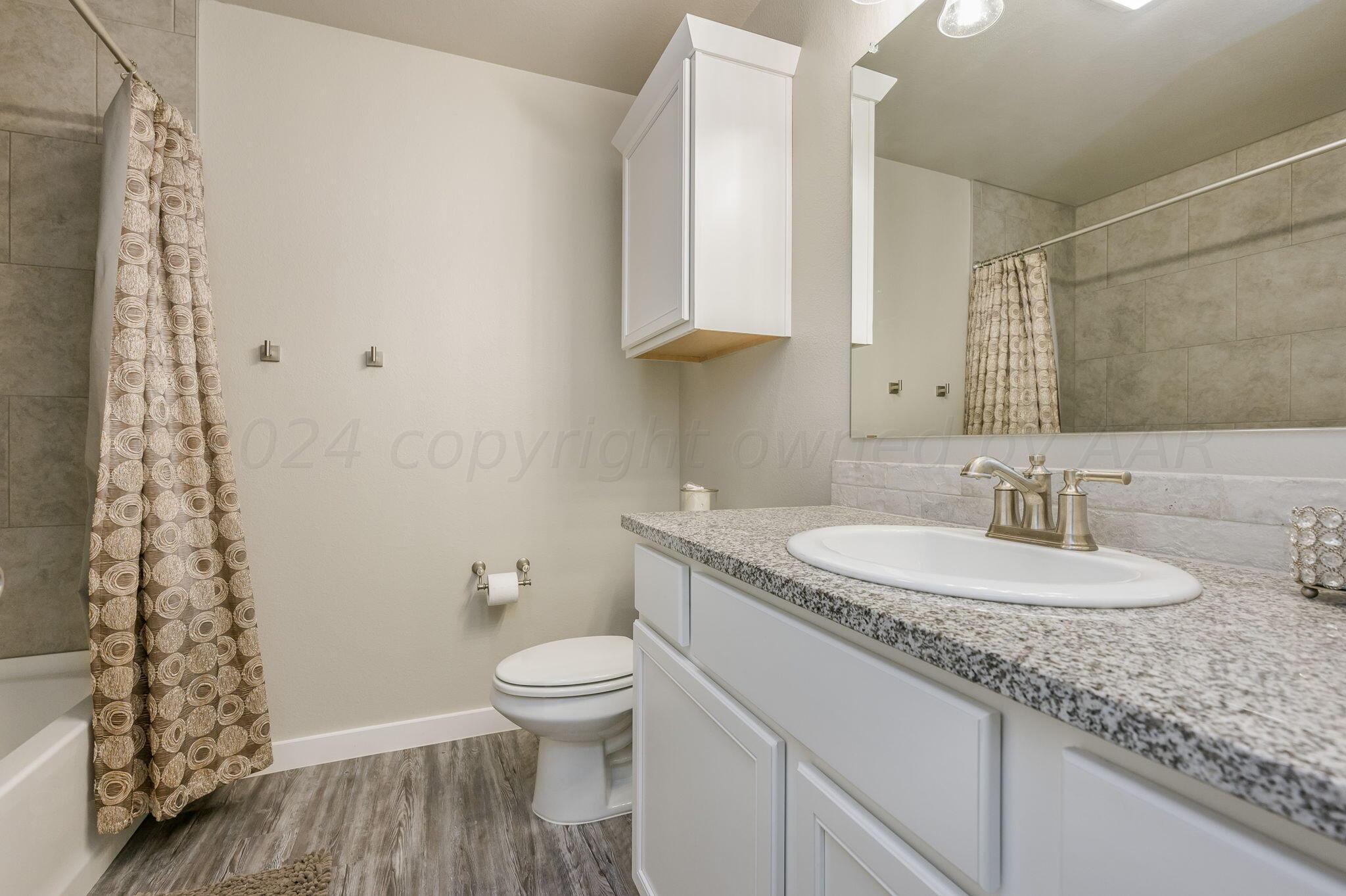 1742 Lullwater Road Amarillo, TX 79118 - Photo 18 of 21 Hall Bathroom