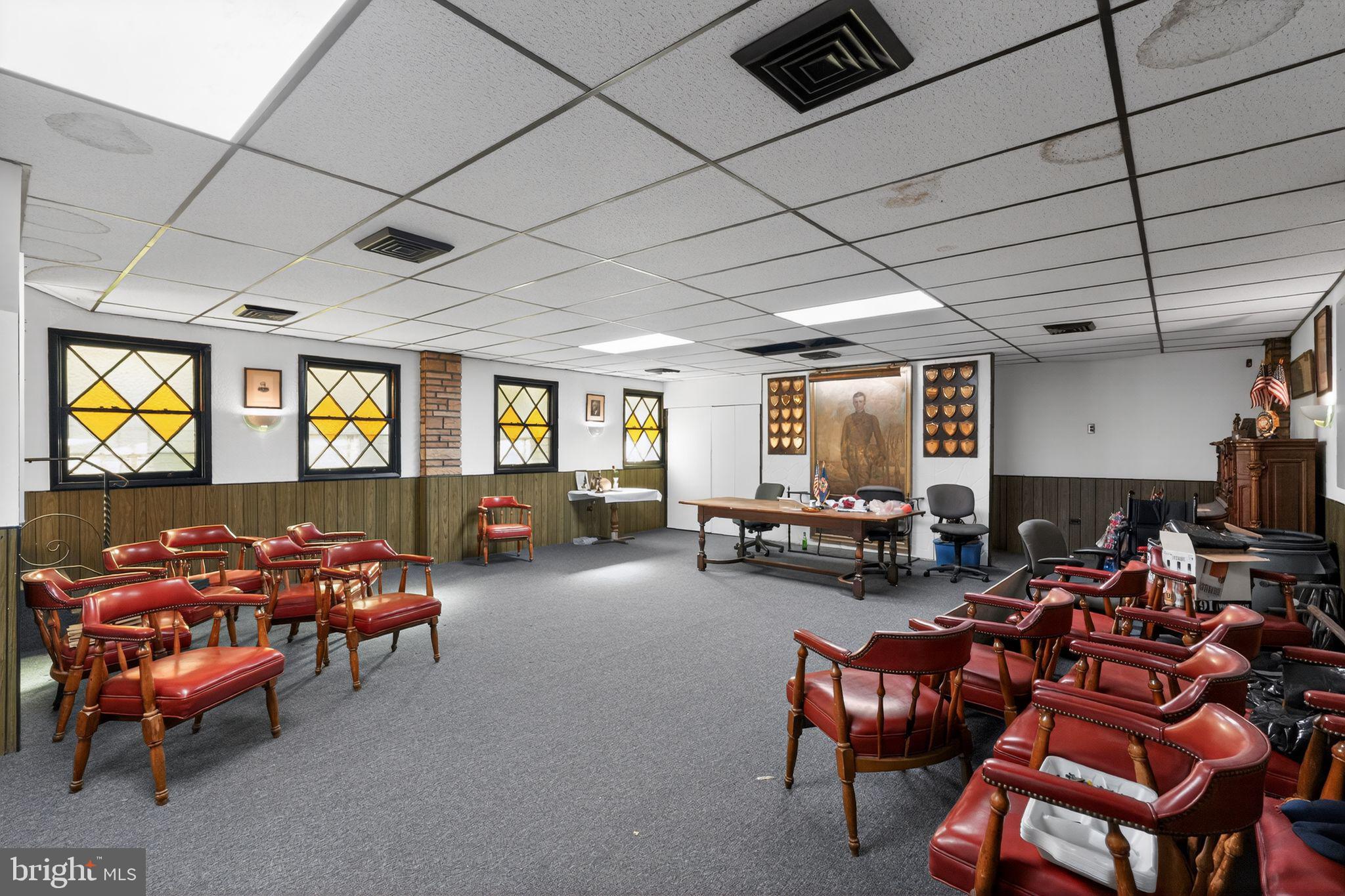 6600 Ridge Avenue Philadelphia, PA 19128 - Photo 14 of 47 a room with lots of furniture and a chandelier