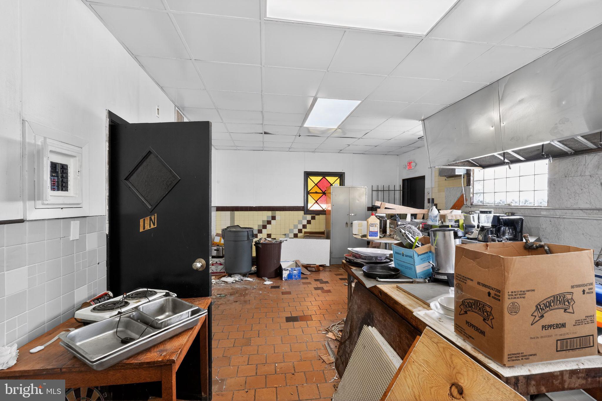 6600 Ridge Avenue Philadelphia, PA 19128 - Photo 17 of 47 a view of a kitchen with workspace and a window